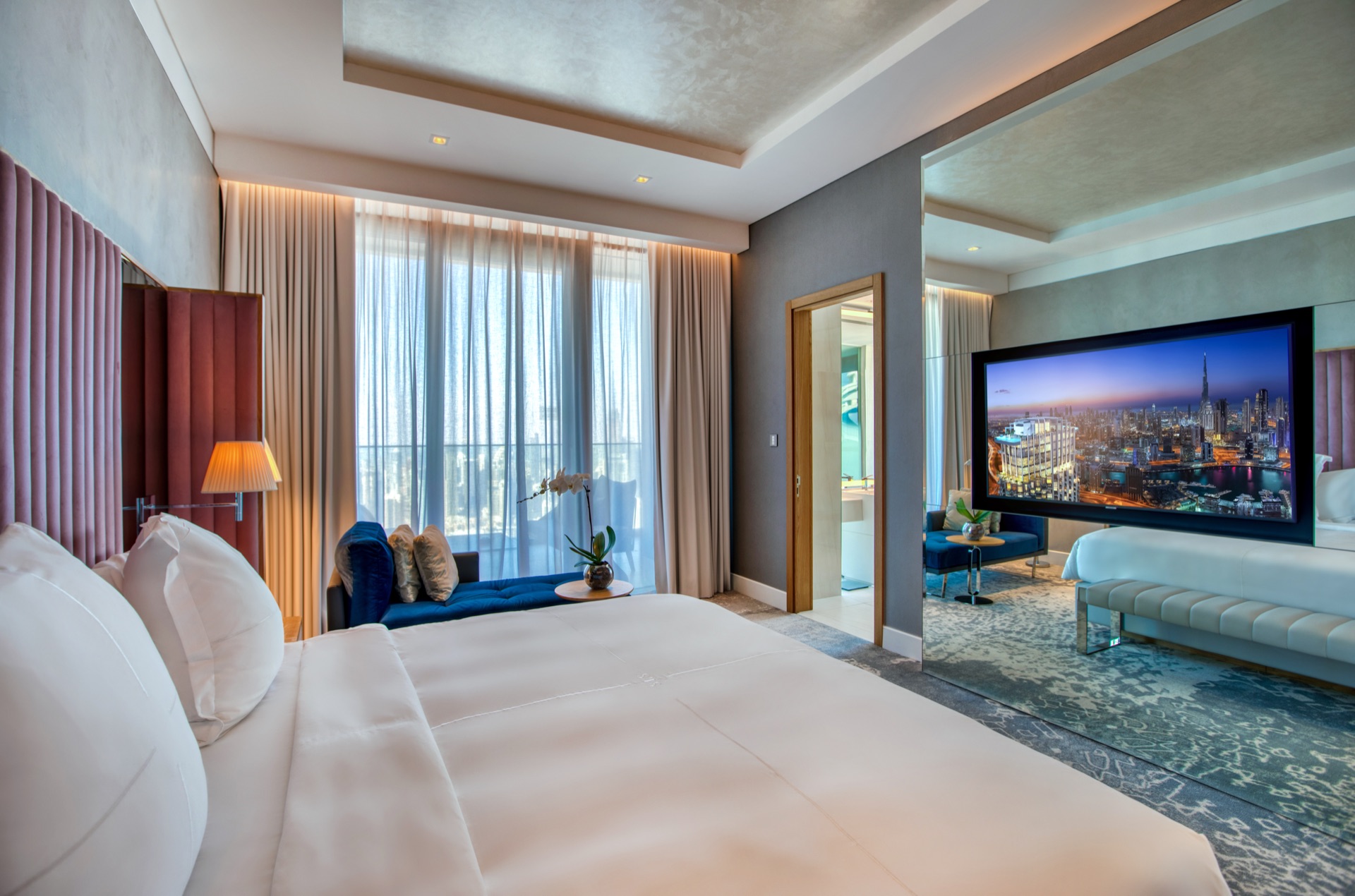 SLS Dubai bedroom with Lutron sheer drapes creating ambient lighting